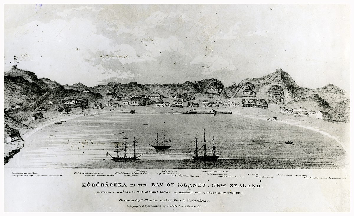 This view of Kororāreka from the Bay was drawn by Captain Clayton on 10 March 1845, the day before the town was attacked by the forces of Hōne Heke and Kawiti. The ships in the foreground are the Hazard, Victoria and Matilda. The contested flagstaff can be seen at left atop Maiki Hill.