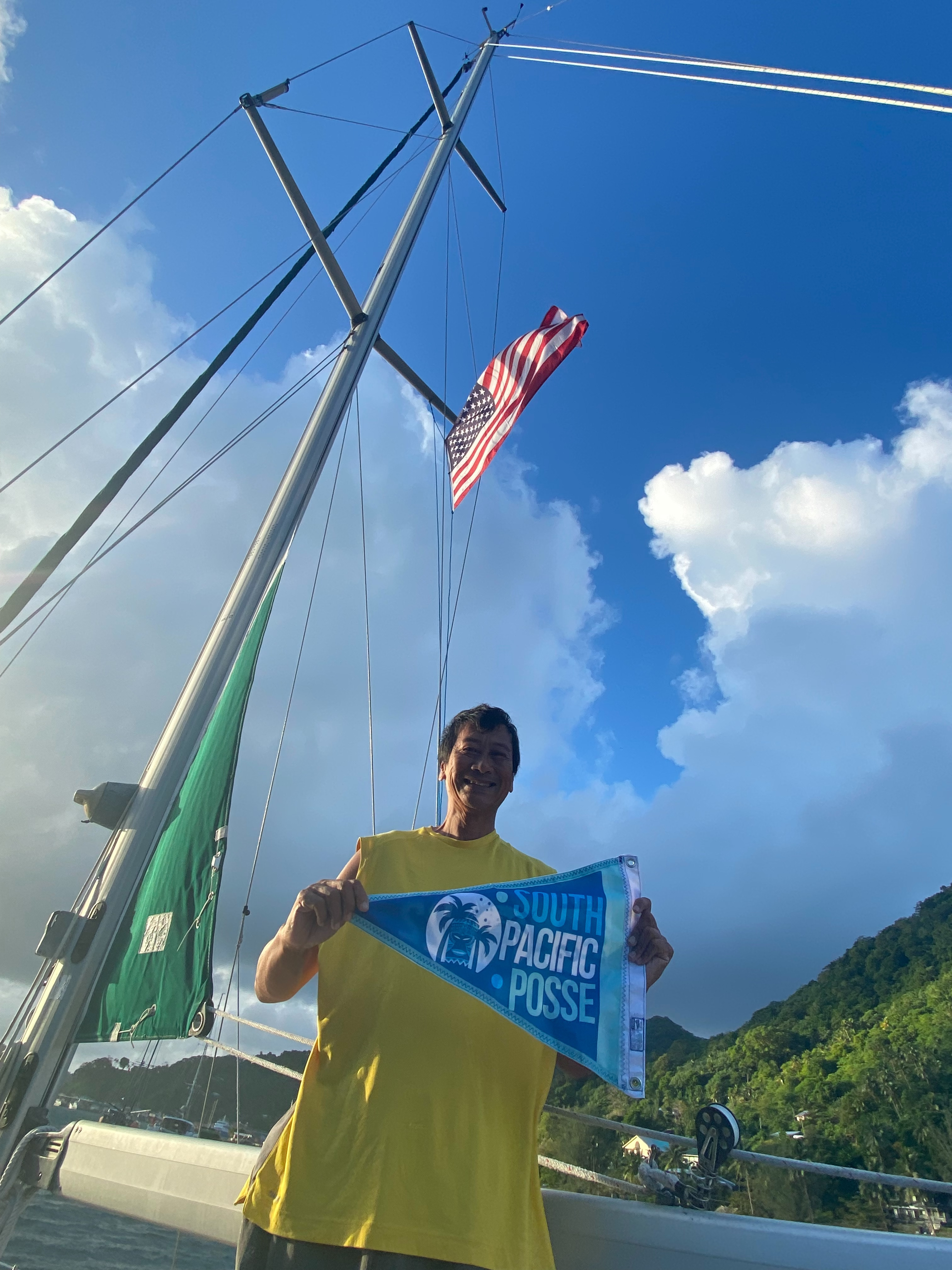 David Hoists the South Pacific Posse burgee in Pago  Pago